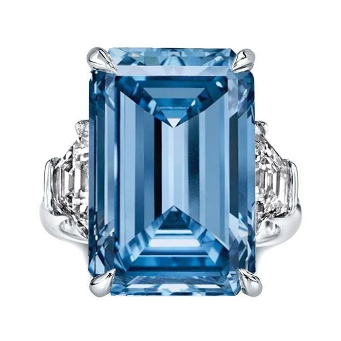 Three Stone Emerald Cut Blue Topaz Engagement Ring
