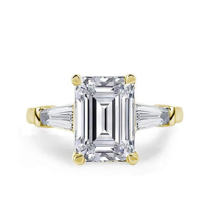 Golden Three Stone Emerald Engagement Ring