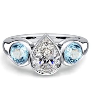 Italo Bezel Setting Pear Cut Aquamarine Three Stone Engagement Rings