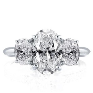 Three Stone Oval Created White Sapphire Engagement Ring