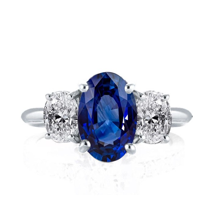 Italo Three Stone Oval Cut Blue Sapphire Engagement Ring