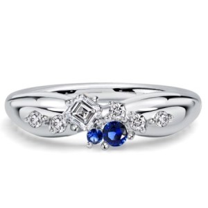 Italo Pinched Band Round Cut Blue Sapphire Wedding Band For Women