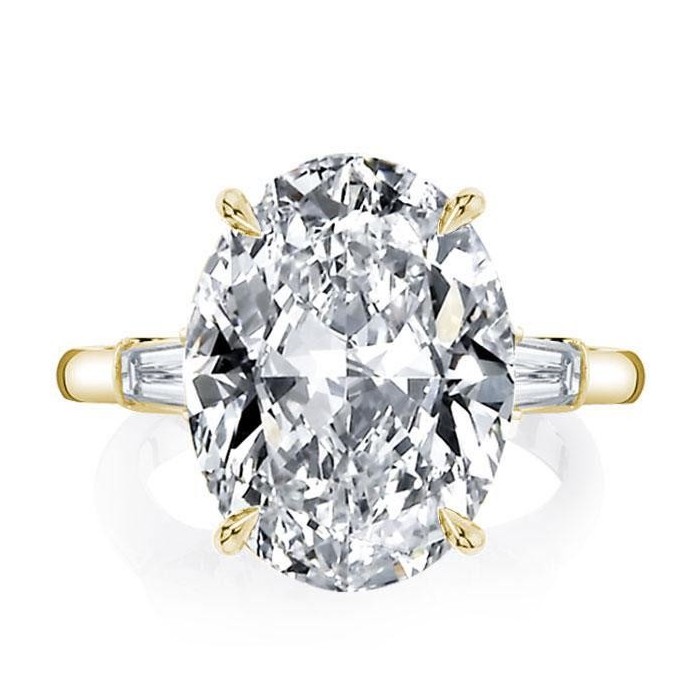 Golden Oval Three Stone Engagement Ring