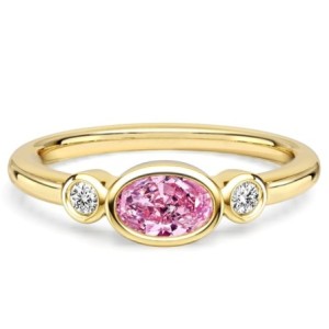 Italo Bezel Setting Oval Cut Pink Sapphire Three Stone Engagement Rings