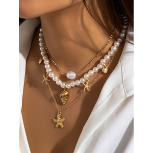 Ocean-Inspired Seashell And Diamond-Encrusted Tassel Necklace With Multi-Cross Pendant.