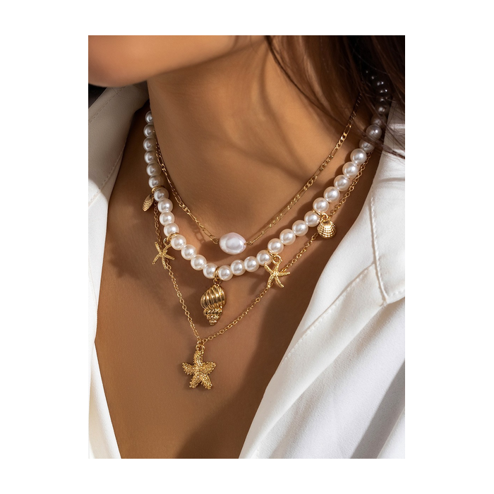 Ocean-Inspired Seashell And Diamond-Encrusted Tassel Necklace With Multi-Cross Pendant.