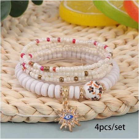 Hot Selling Bohemian Style Multi-layer Rice Bead Bracelet Stacked With Evil Eye Pendant Handmade Adjustable Jewelry